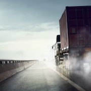 Truck moving fast on wet road after heavy rain,bad weather cond
